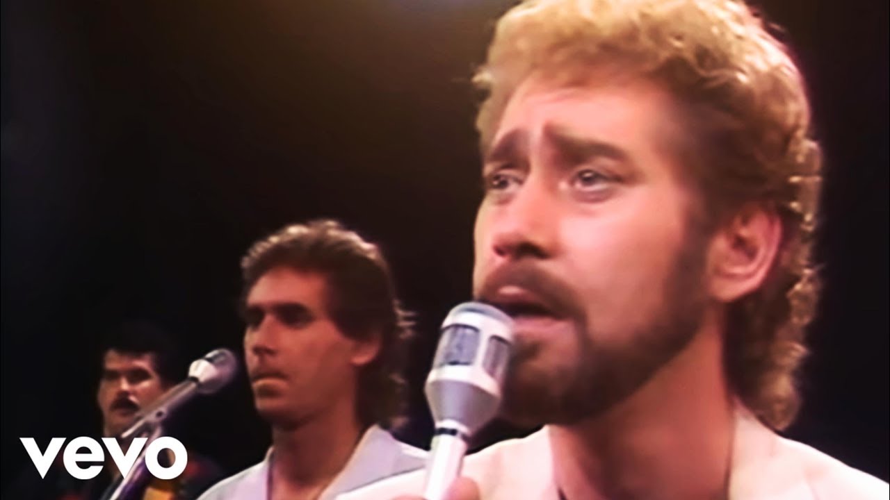 Holding Her and Loving You by Earl Thomas Conley