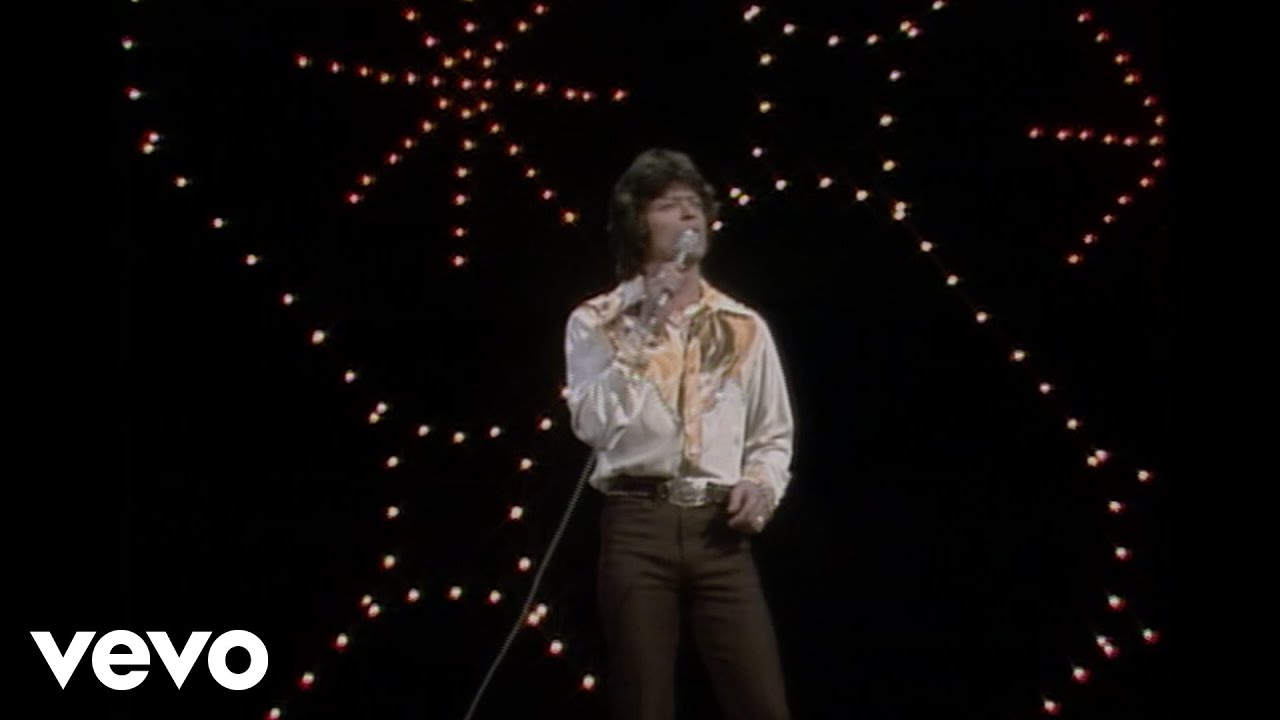 Love Put a Song in My Heart by Johnny Rodriguez